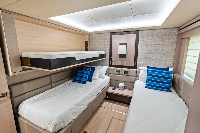 Slide: The Image of Luxurious cabin interior of 2019 Sunseeker 86 Yacht with modern twin beds. - 32