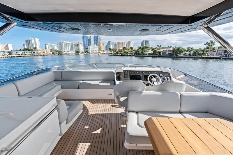 Slide: The Image of Luxurious 2019 Sunseeker 86 Yacht interior with city skyline view. - 33