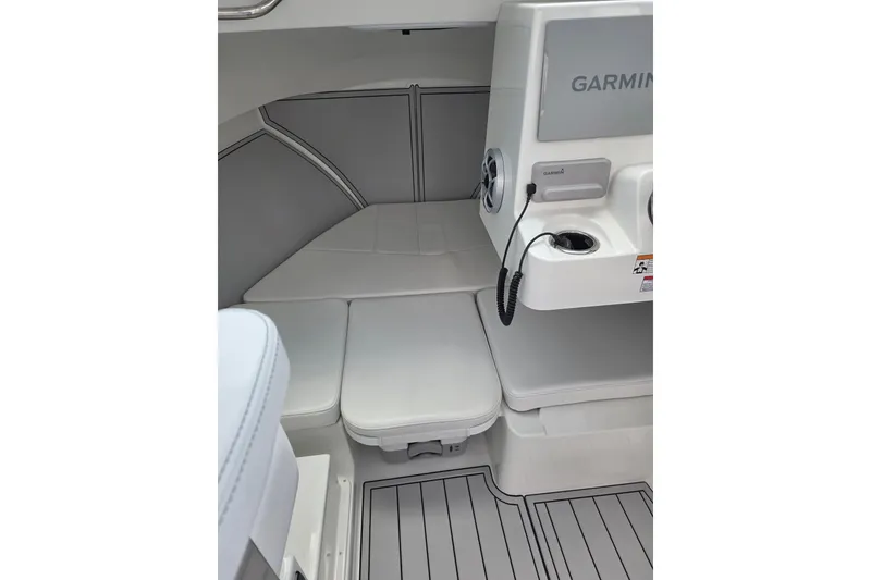 Slide: The Image of Interior of 2026 Parker 247 Explorer boat with Garmin navigation system. - 17