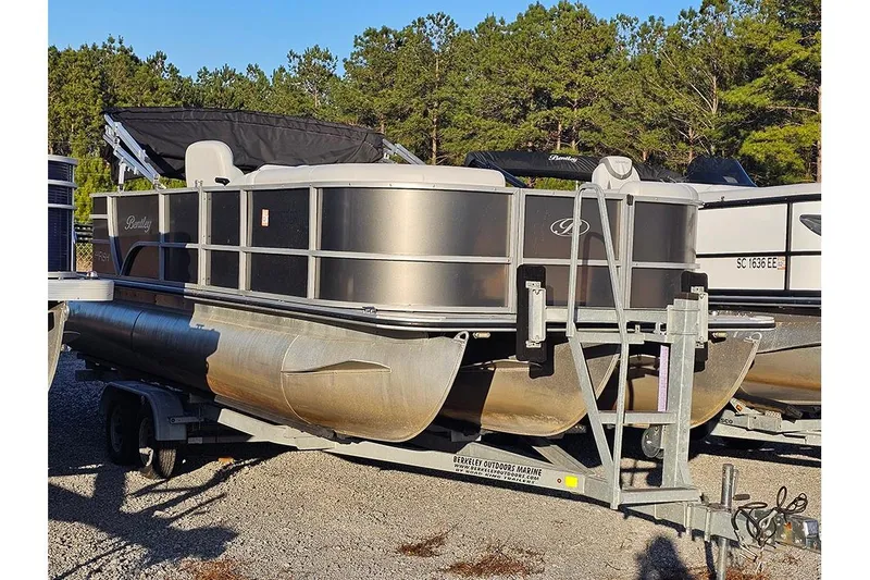 Slide: The Image of 2021 Bentley Pontoons 223 Fish-N-Cruise on trailer, parked outdoors. - 3