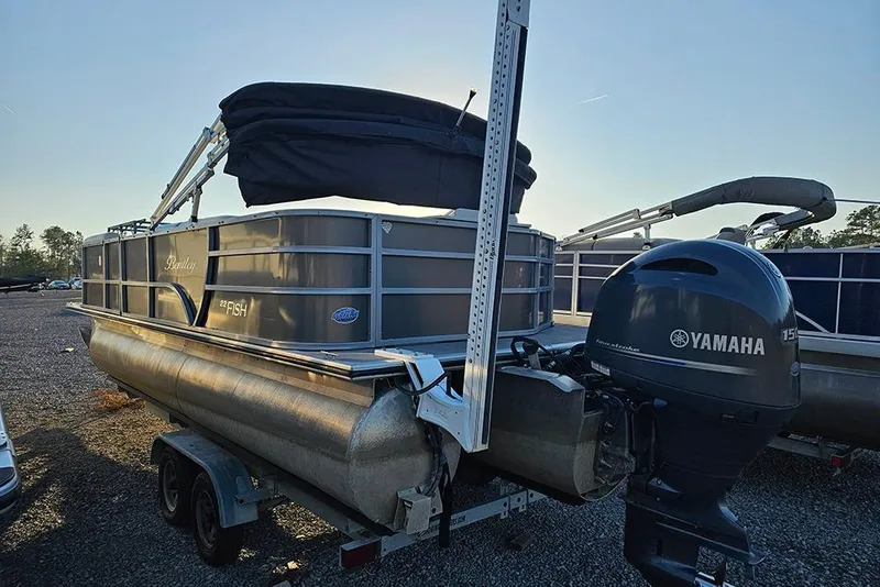 Slide: The Image of 2021 Bentley Pontoons 223 Fish-N-Cruise with Yamaha outboard motor on trailer. - 4