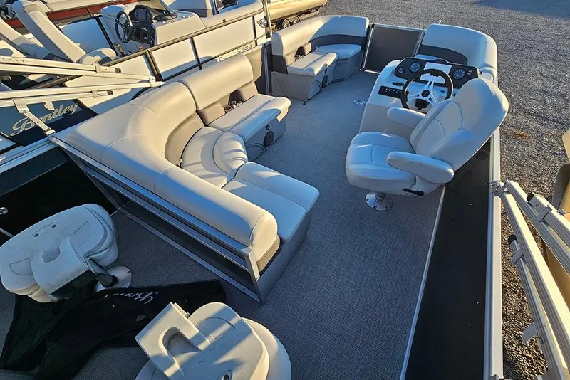 Slide: The Image of 2021 Bentley Pontoons 223 Fish-N-Cruise interior with plush seating and modern helm. - 8