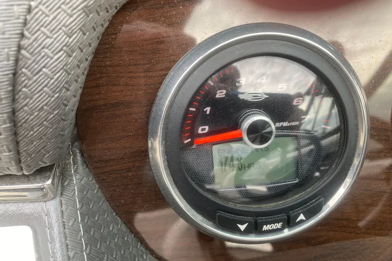 Slide: The Image of Close-up of 2018 Chaparral 227 SSX tachometer displaying engine hours. - 10