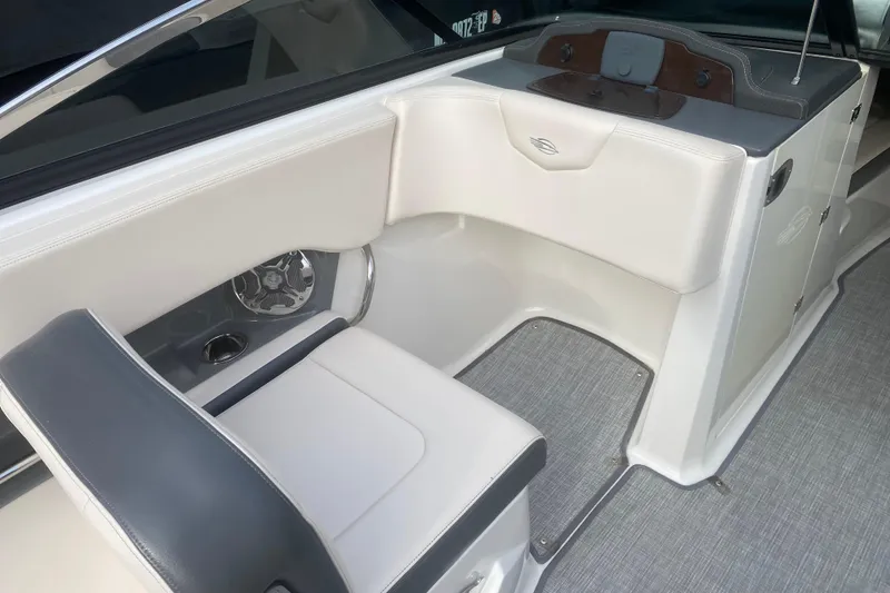 Slide: The Image of Interior of 2018 Chaparral 227 SSX boat with white and gray seating. - 6