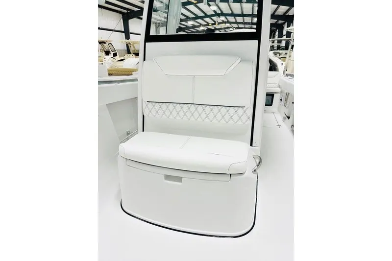 Slide: The Image of 2026 Sportsman Heritage 261 Center Console, featuring sleek white seating and modern design. - 6