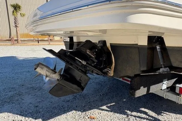 Slide: The Image of 2018 Sea Ray Sundancer 260 boat stern and propeller on trailer. - 24