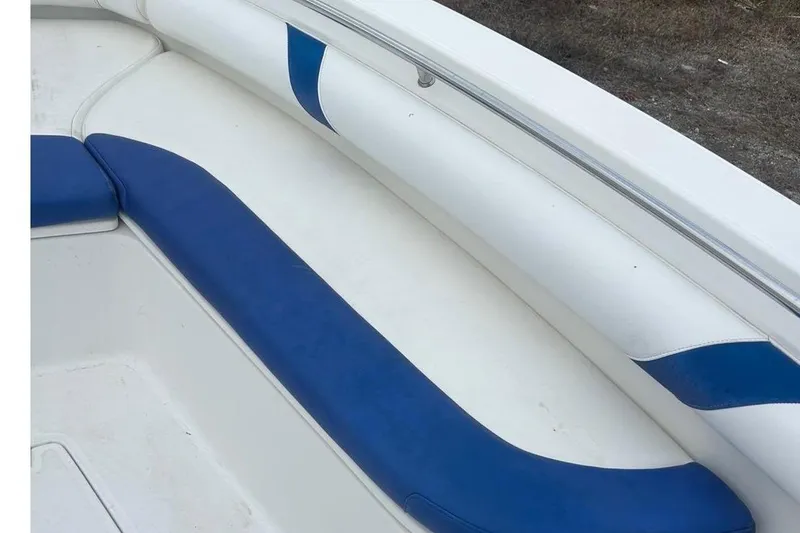 Slide: The Image of Interior view of 2007 Boston Whaler 320 Outrage with blue upholstery. - 19