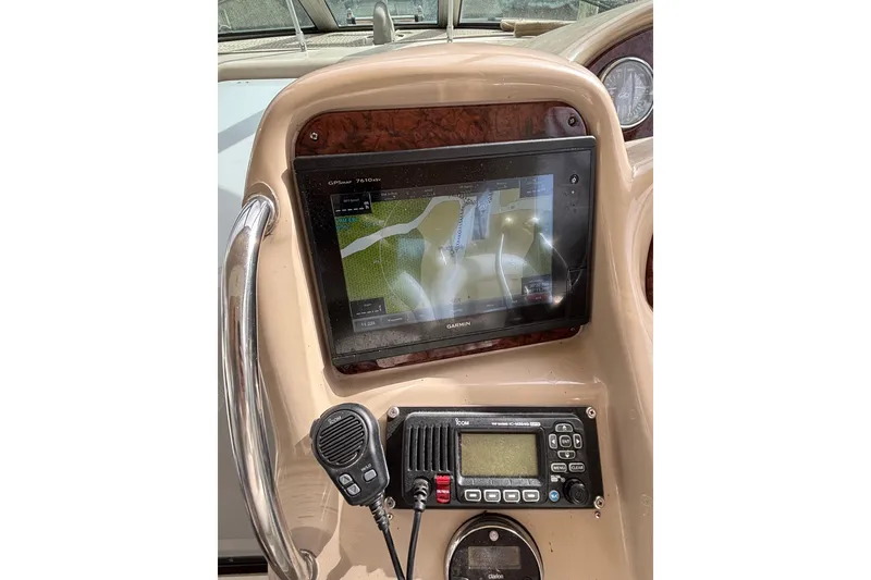Slide: The Image of Control panel of a 2003 Sea Ray 340 Sundancer with Garmin GPS and radio equipment. - 11