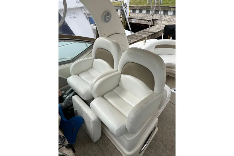 Slide: The Image of Luxury seating on a 2003 Sea Ray 340 Sundancer yacht, featuring plush white upholstery. - 8