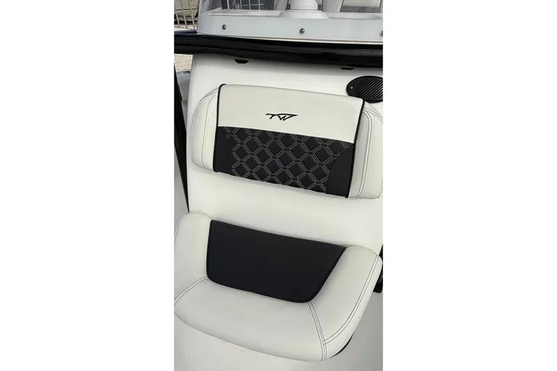 Slide: The Image of 2023 Tidewater 220 LXF boat seat with stylish black and white design. - 32
