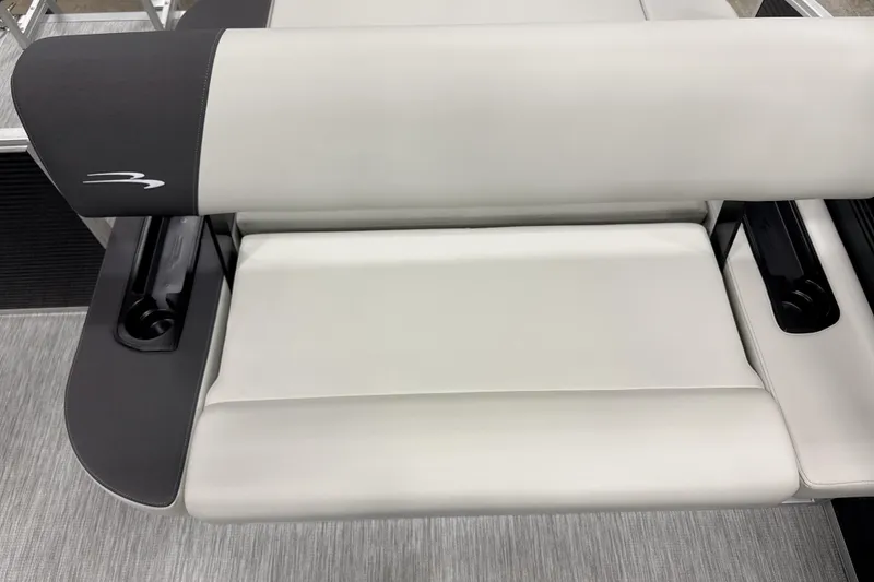 Slide: The Image of 2026 Bennington S Swingback 22 SSB boat interior with modern helm and seating. - 6