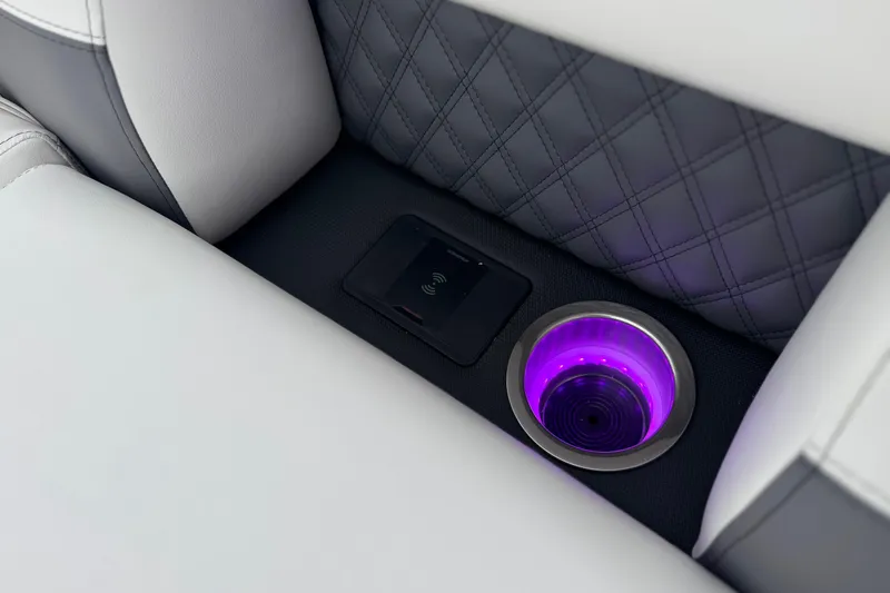 Slide: The Image of Luxurious interior of 2026 Berkshire 21CL STS with illuminated cup holder and wireless charging pad. - 15