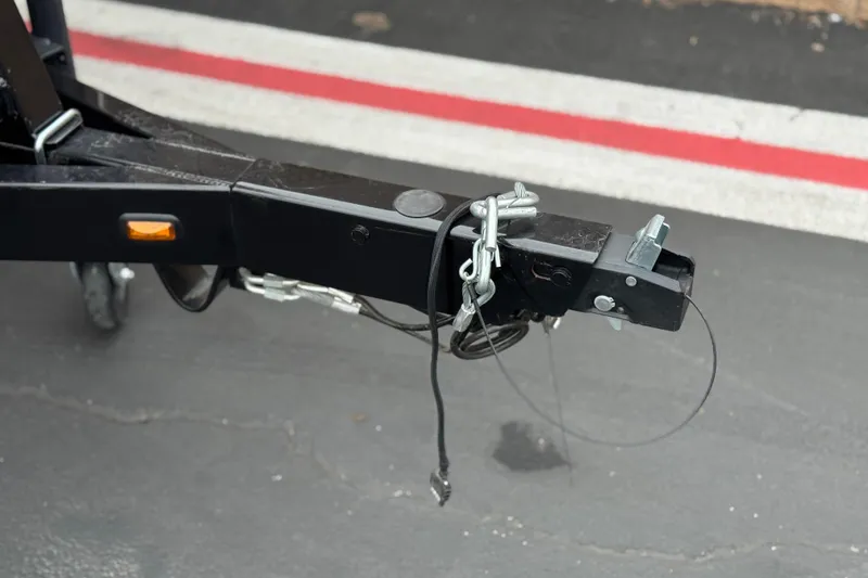 Slide: The Image of Trailer hitch of a 2026 Berkshire 21CL STS on asphalt pavement. - 33