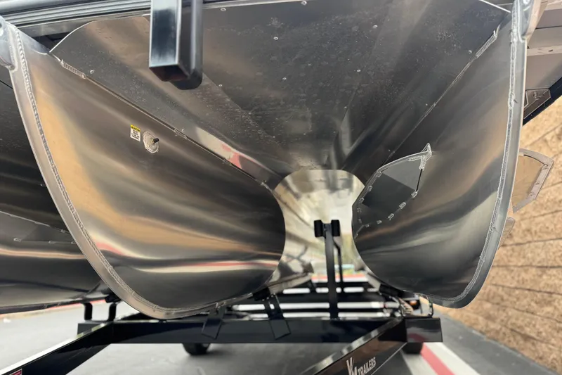 Slide: The Image of Underneath view of a 2026 Berkshire 21CL STS pontoon boat on a trailer. - 4