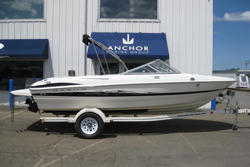 The Image of 2005 Maxum 1900 SR3 boat on trailer outside Anchor Marine Group building. - 0
