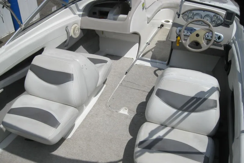 Slide: The Image of 2005 Maxum 1900 SR3 boat interior with gray and white seating. - 11