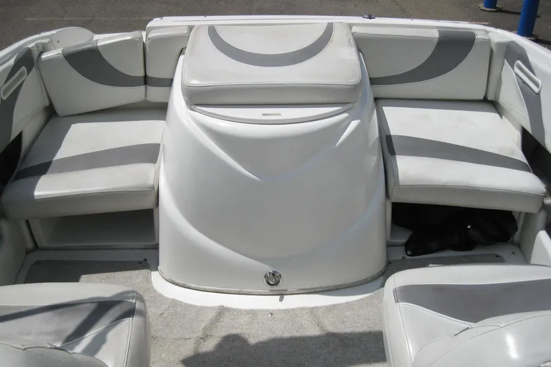 Slide: The Image of 2005 Maxum 1900 SR3 boat interior with gray and white seating and dashboard. - 12