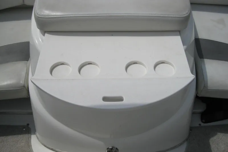 Slide: The Image of 2005 Maxum 1900 SR3 boat interior with white and gray seating arrangement. - 13