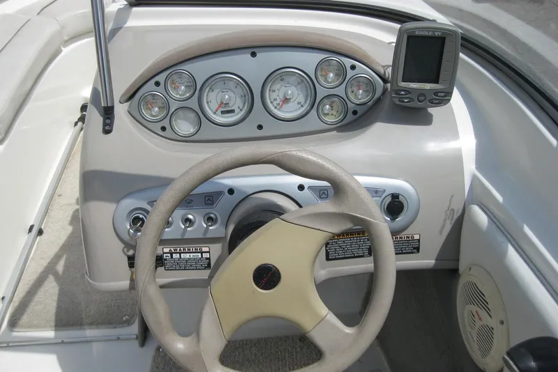 Slide: The Image of Torn seat upholstery in a 2005 Maxum 1900 SR3 boat interior. - 16