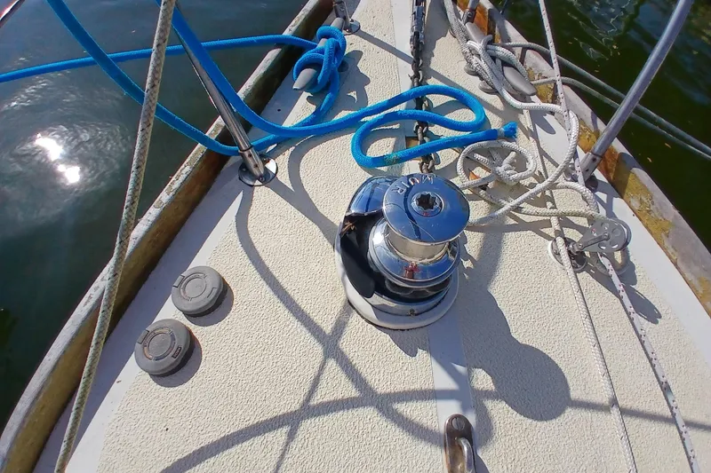 Slide: The Image of Deck of 1977 Tartan 37 with ropes and winch. - 40
