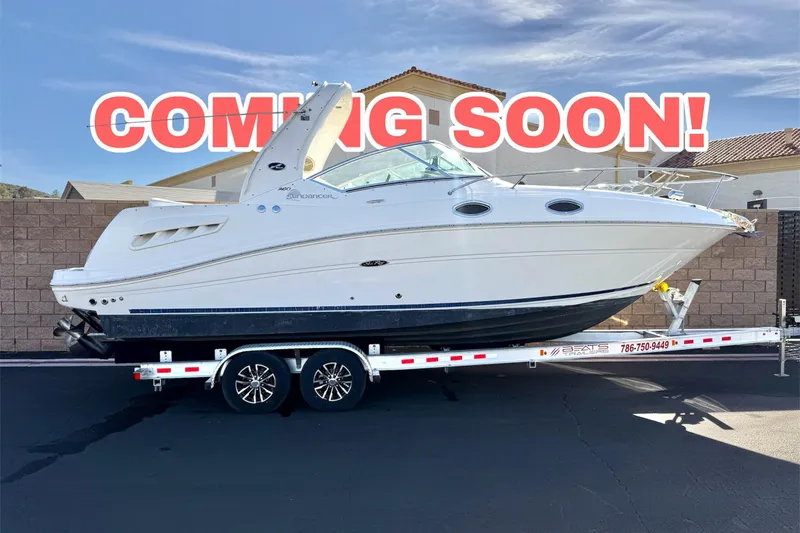 The Image of 2006 Sea Ray Sundancer 260 boat on trailer, "Coming Soon" text overlay. - 1