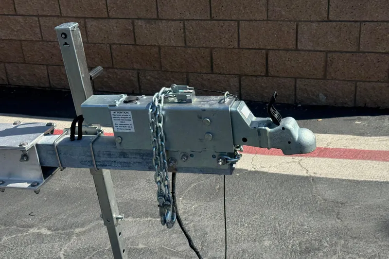 Slide: The Image of Trailer hitch for 2006 Sea Ray Sundancer 260 boat, secured with chain. - 33