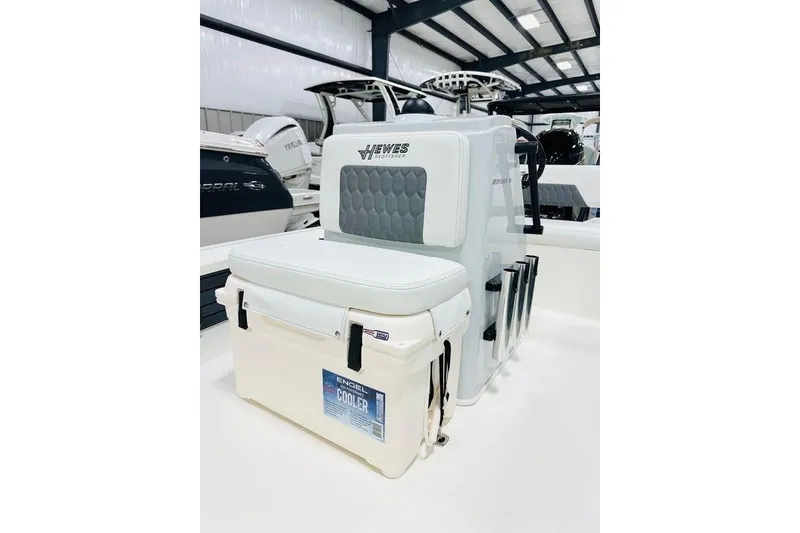 Slide: The Image of 2026 Hewes Redfisher 18 boat interior with Engel cooler and rod holders. - 3