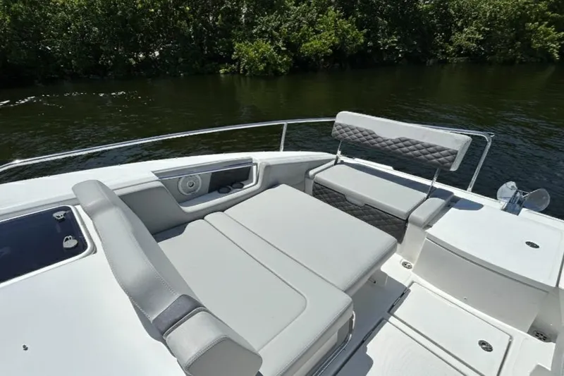 Slide: The Image of Aquila 36 Sport 2020 boat with luxurious seating on a sunny day. - 23