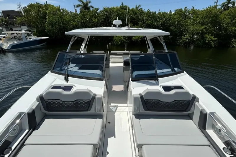 Slide: The Image of Aquila 36 Sport 2020 boat with sleek design and spacious seating on a sunny day. - 25