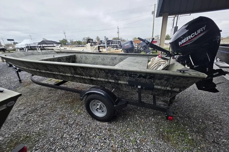 Slide: The Image of 2026 Tracker Grizzly 1754 Utility boat with Mercury engine on trailer. - 5