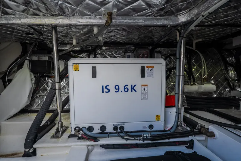 Slide: The Image of Engine room of 2025 Invictus TT430 yacht featuring IS 9.6K generator. - 85