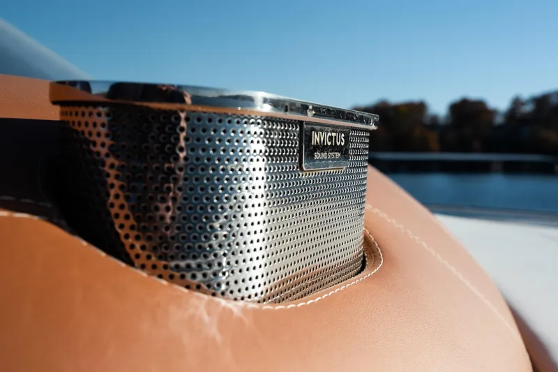 Slide: The Image of Invictus TT430 2025 sound system detail on luxury yacht, featuring sleek design. - 14
