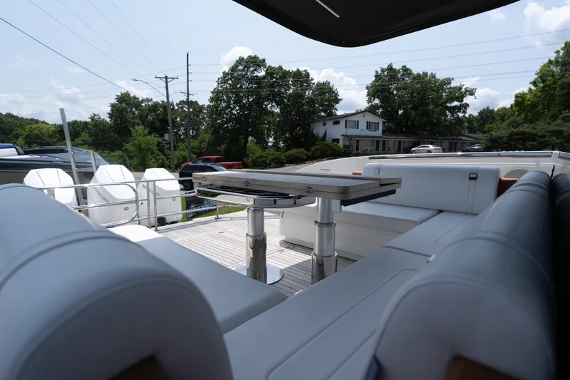 Slide: The Image of Luxurious seating area on 2025 Invictus TT430 yacht, featuring sleek design and modern amenities. - 19