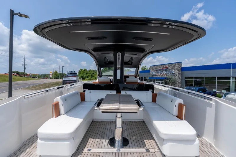 Slide: The Image of Luxurious 2025 Invictus TT430 yacht interior with sleek seating and modern design. - 11