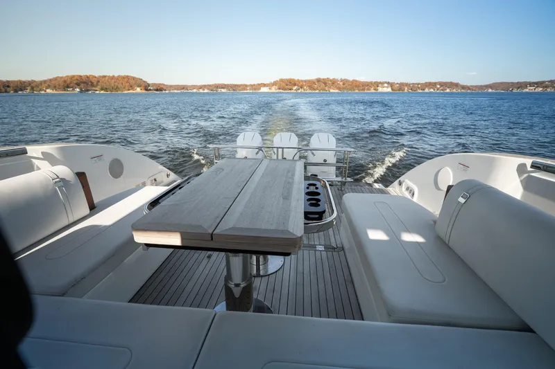 Slide: The Image of Luxurious 2025 Invictus TT430 yacht interior with elegant seating and scenic water view. - 27