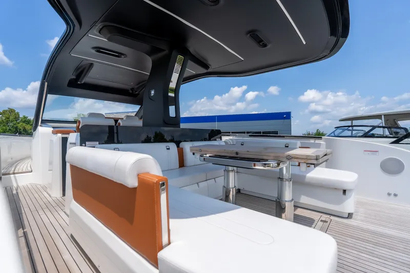 Slide: The Image of Luxurious 2025 Invictus TT430 yacht interior with sleek seating and modern design. - 21