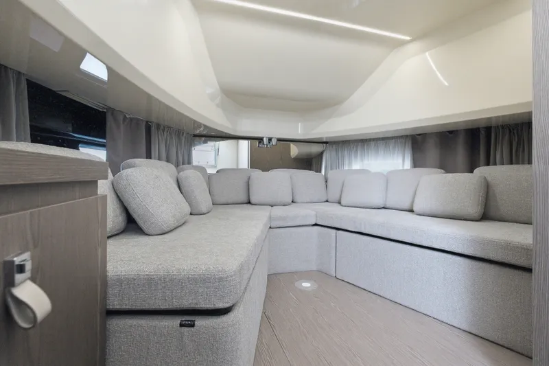 Slide: The Image of Luxurious interior of 2025 Invictus TT430 yacht with plush seating and modern design. - 78