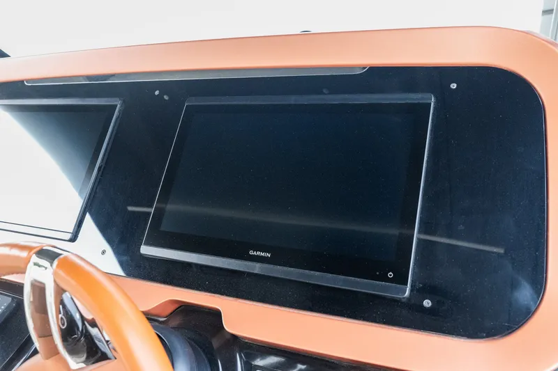 Slide: The Image of Dashboard of 2025 Invictus TT430 with Garmin display and steering wheel. - 37