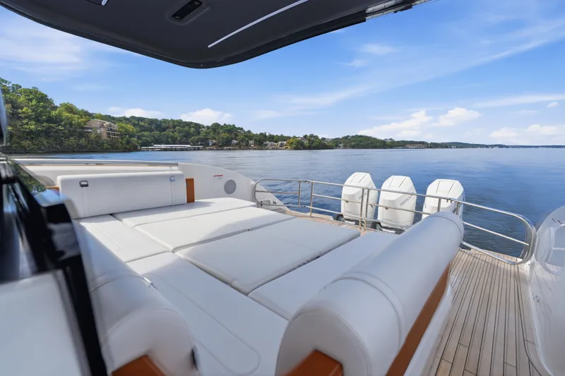 Slide: The Image of Luxurious 2025 Invictus TT430 yacht with spacious deck and scenic water view. - 91