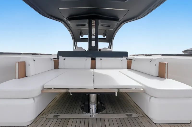 Slide: The Image of Luxurious interior of 2025 Invictus TT430 yacht with sleek white seating and modern design. - 93