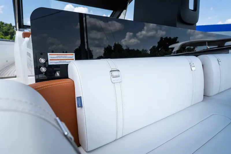Slide: The Image of Luxurious white seating on 2025 Invictus TT430 yacht, featuring sleek design and premium materials. - 49