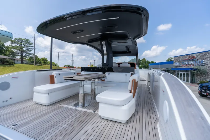 Slide: The Image of Luxurious 2025 Invictus TT430 yacht with sleek seating and modern design. - 10