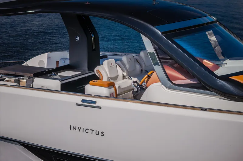 Slide: The Image of Luxury Invictus TT430 yacht interior, 2025 model, featuring sleek design and premium seating. - 98