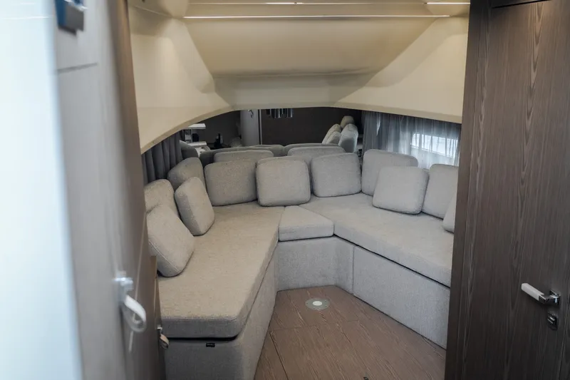 Slide: The Image of Luxurious interior of 2025 Invictus TT430 yacht with plush seating and modern design. - 76