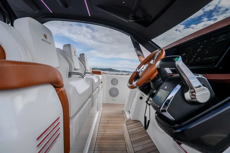 Slide: The Image of Luxurious interior of 2025 Invictus TT430 yacht with sleek design and modern controls. - 57