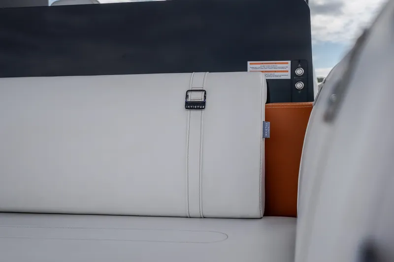 Slide: The Image of Luxurious white leather seating in 2025 Invictus TT430 boat interior. - 29