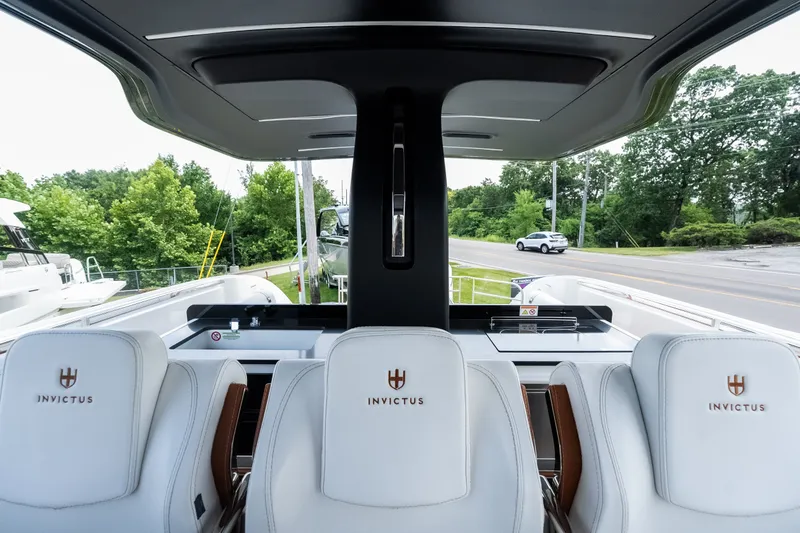 Slide: The Image of Interior view of 2025 Invictus TT430 yacht with luxurious seating and modern design. - 41