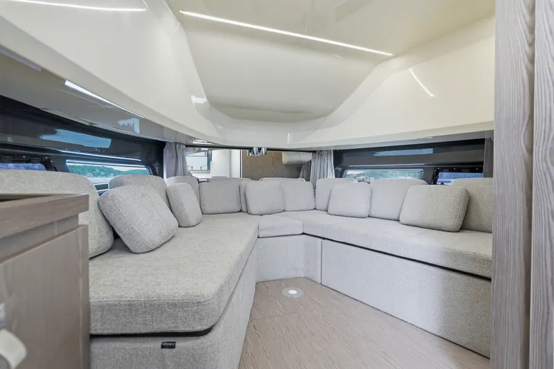 Slide: The Image of Luxurious interior of 2025 Invictus TT430 yacht with spacious seating area. - 82