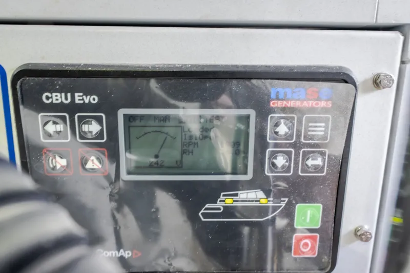 Slide: The Image of Control panel of a Mase generator, featuring CBU Evo interface on Invictus TT430, 2025 model. - 90