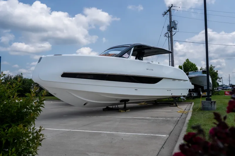 The Image of 2025 Invictus TT430 yacht displayed outdoors on a sunny day. - 1